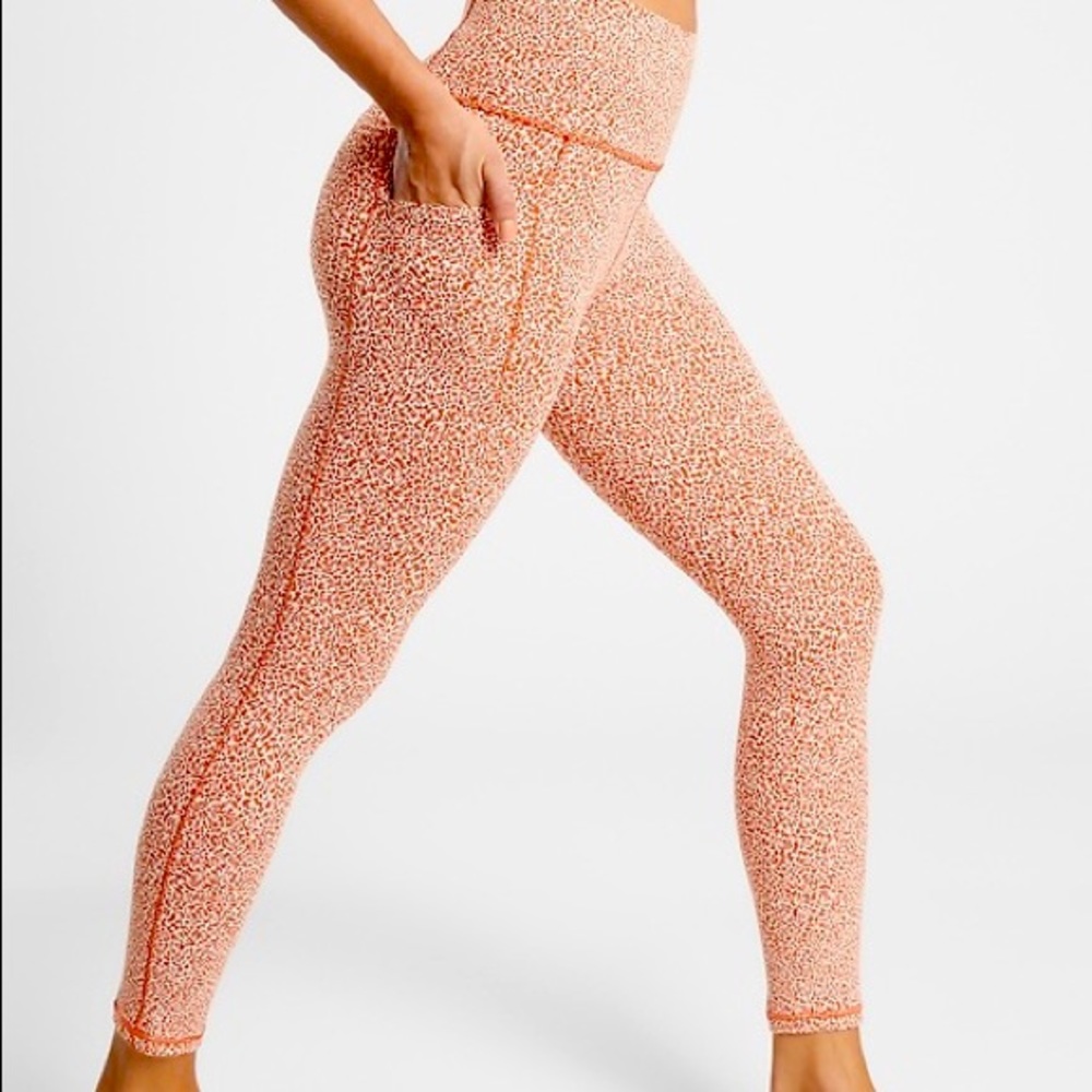 ATHLETA SALUTATION STASH ll textured micro cheetah pattern - rust . NWOT - Picture 1 of 2